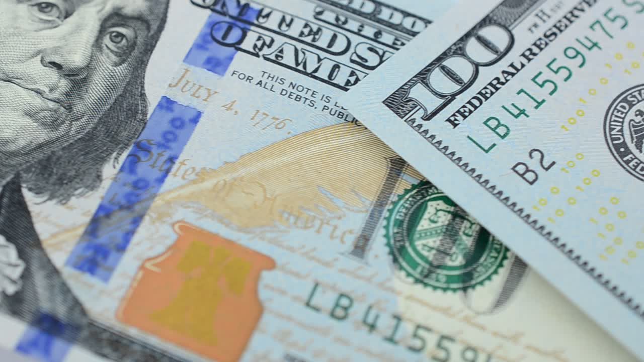 Dollar banknotes. Shooting of money
