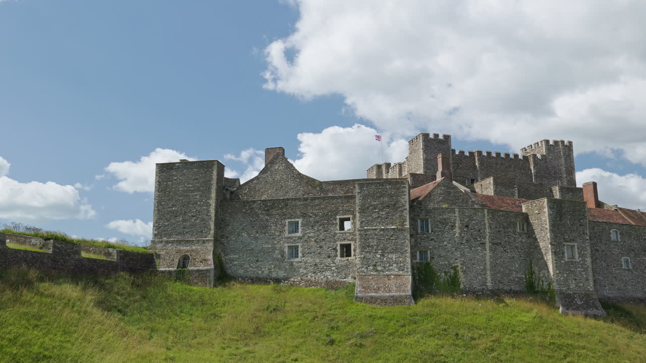 Handheld pan footage showing the historic stone walls of Dover Castle in Kent, England