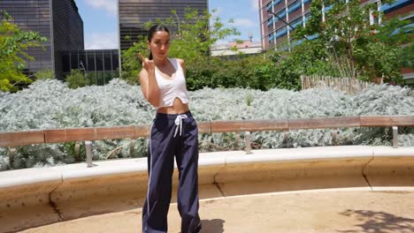 woman dancing in urban park