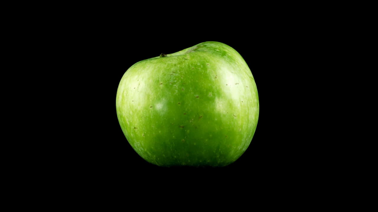 Æble på sort baggrund.