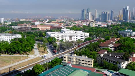 Aerial panoramic cityscape of Manila, Philippines with National Museum of Fine Arts and historical Intramuros walled city