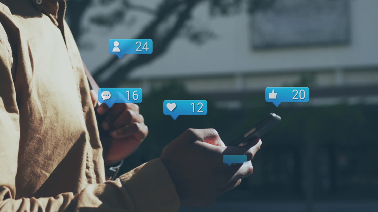 Animation of social media icons and data over african american man using smartphone