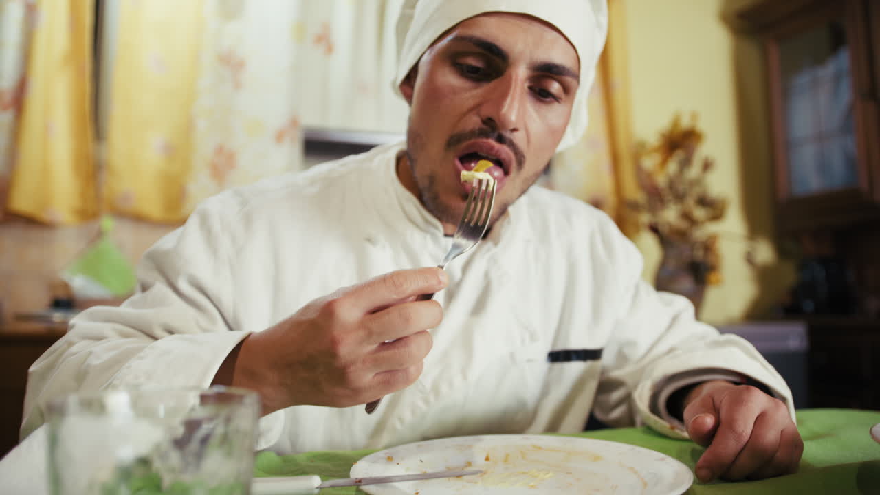 Hungry Italian Chef Eats French Fries Before Finishing His Dish