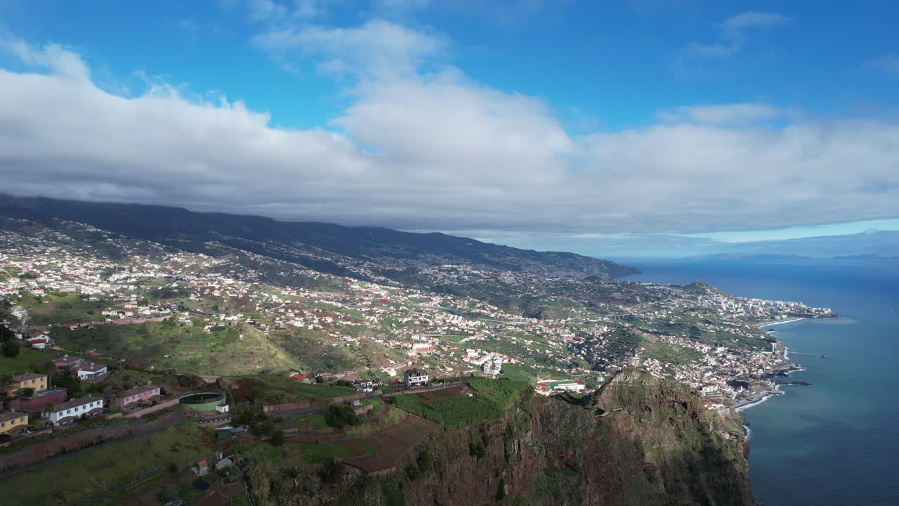 aerial shot taken from Cabo Girao and where you can see a panoramic view of the island of madeira as well as the ocean
