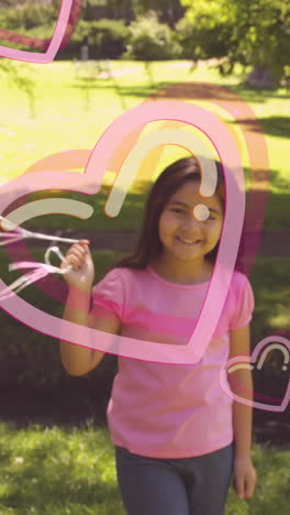 animation of violet ribbon over happy biracial girl with pink balloons running