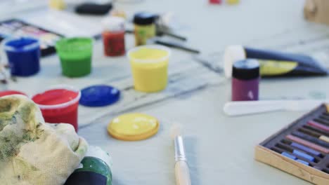 close up of paints in studio, slow motion