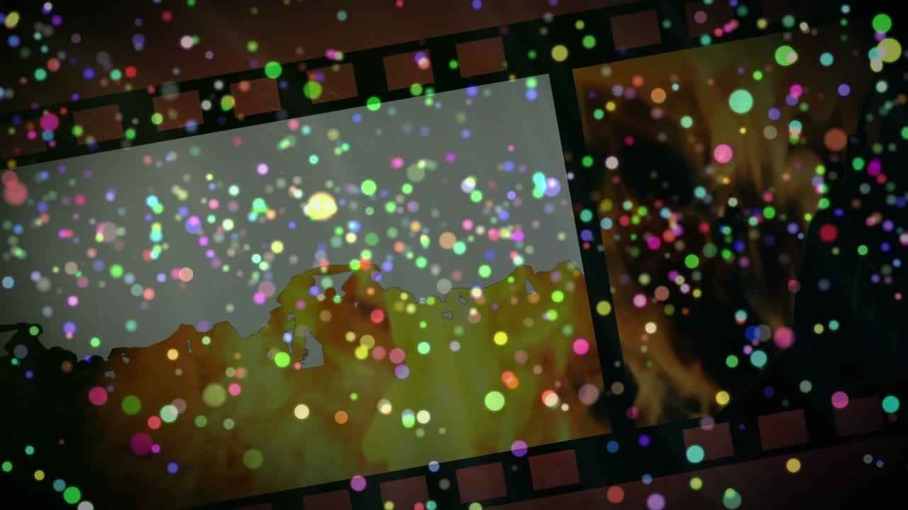 검은 바탕 위에 움직이는 다채로운 점들의 애니메이션