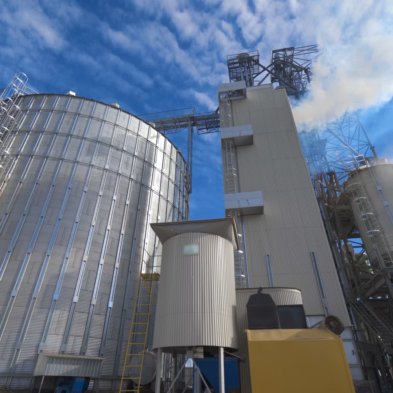 Exterior of aluminum equipment of a modern complex. Thick white smoke goes into the air from the large agricultural plant during grain processing