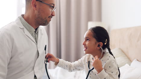 bed, stethoscope and happy child playing