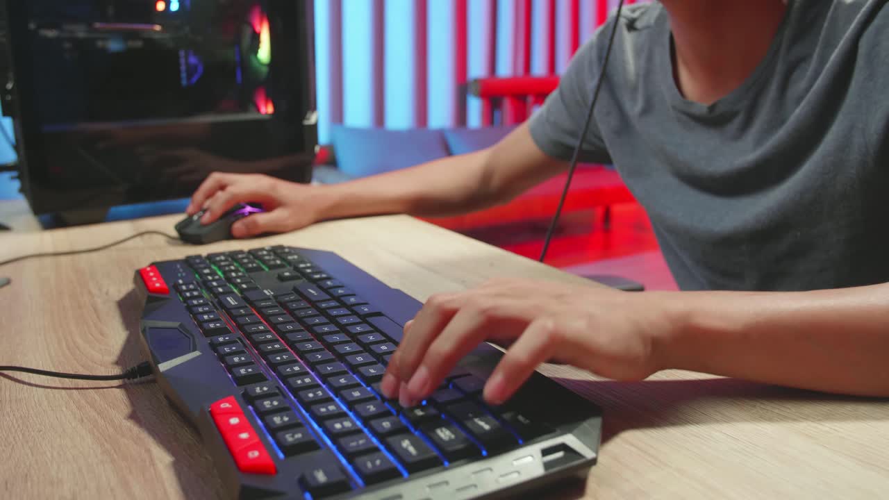 Hands Of Gamer Man Playing Video Games On Computer