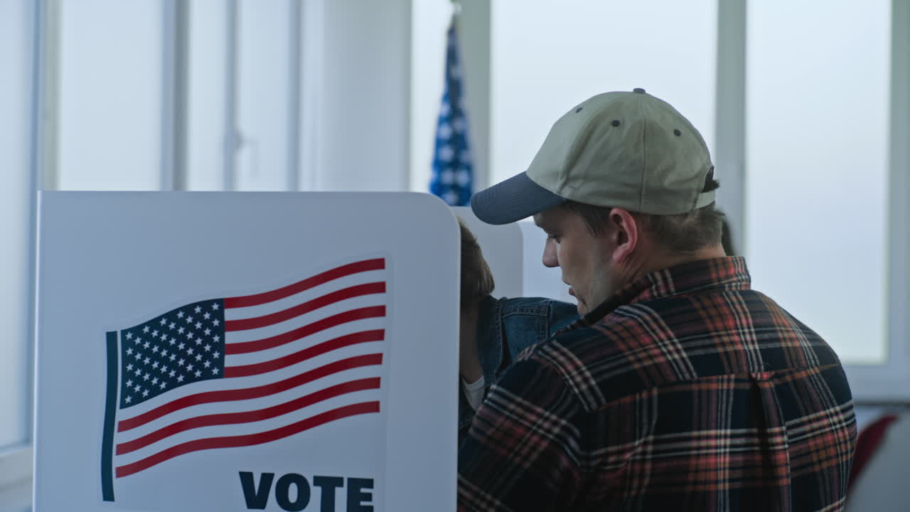 People Voting at a Polling Station