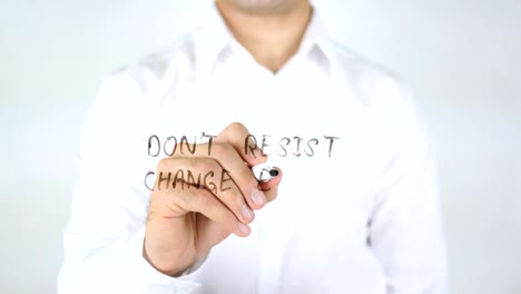 don't resist change embrace it, man writing on glass