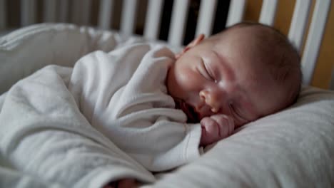sleeping baby in a crib