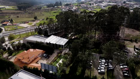 event venue surrounded by forested hills and roadways in northern portugal