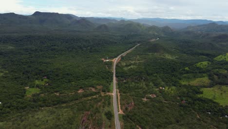 aerial view of a road in the middle of a mountainous region - chapada dos veadeiros, brazil