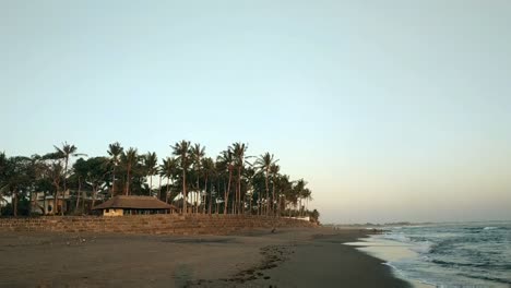 Puesta-De-Sol-En-La-Playa-Con-Palmera