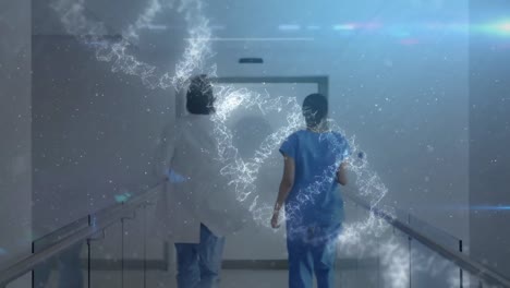 animación digital de la estructura de adn en 3d girando y punto azul de luz contra la doctora y la fema