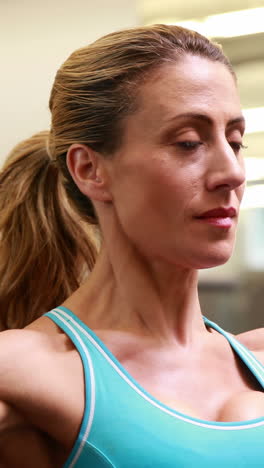 two fit people working out at crossfit session