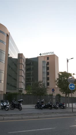 granada, spain, september 16 2022: hospital universitario clinico san cecilio on the outside. vertical video