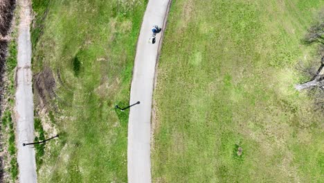 An-aerial-view-over-Flushing-Meadow-Corona-Park-in-Queens,-NY-on-a-sunny-day