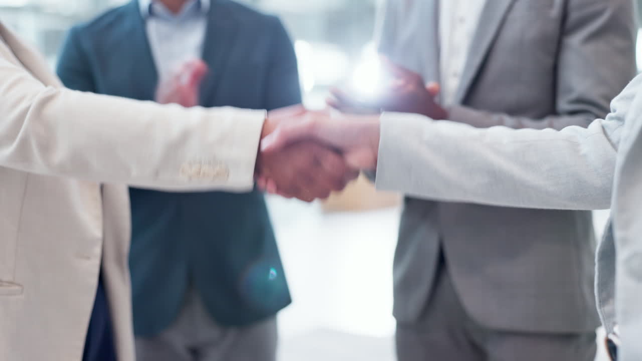 Handshake, applause and team of business people