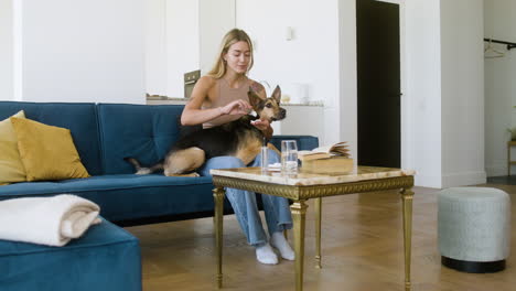 woman and dog at home