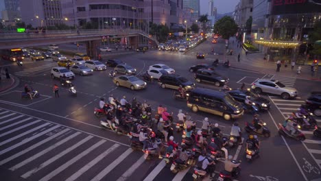 taipei, taiwan - a busy street in xinyi financial district of taipei city in the late evening