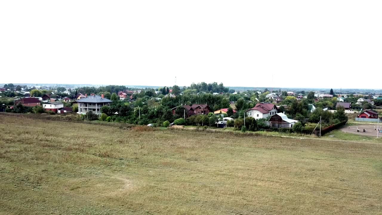 Aerial View of a Small Village with Homes