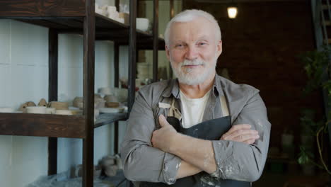 senior potter in workshop