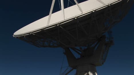 panup of a satellite dish at the national radio astronomy observatory in new mexico