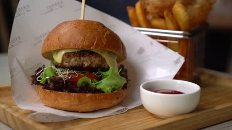 pork-burger-with-onion-rings-and-french-fries