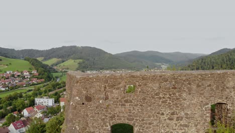 Flown-with-a-drone-through-the-window-of-an-old-castle-ruin