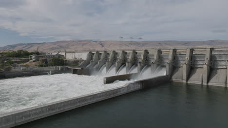 drone aerial of a hydroelectric dam along the