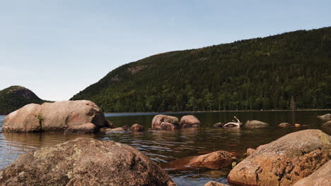 The-glacier-formed-tarn-Jordan-Pond-in-Acadia-National-Park,-Maine,-USA,-slow-panning-shot