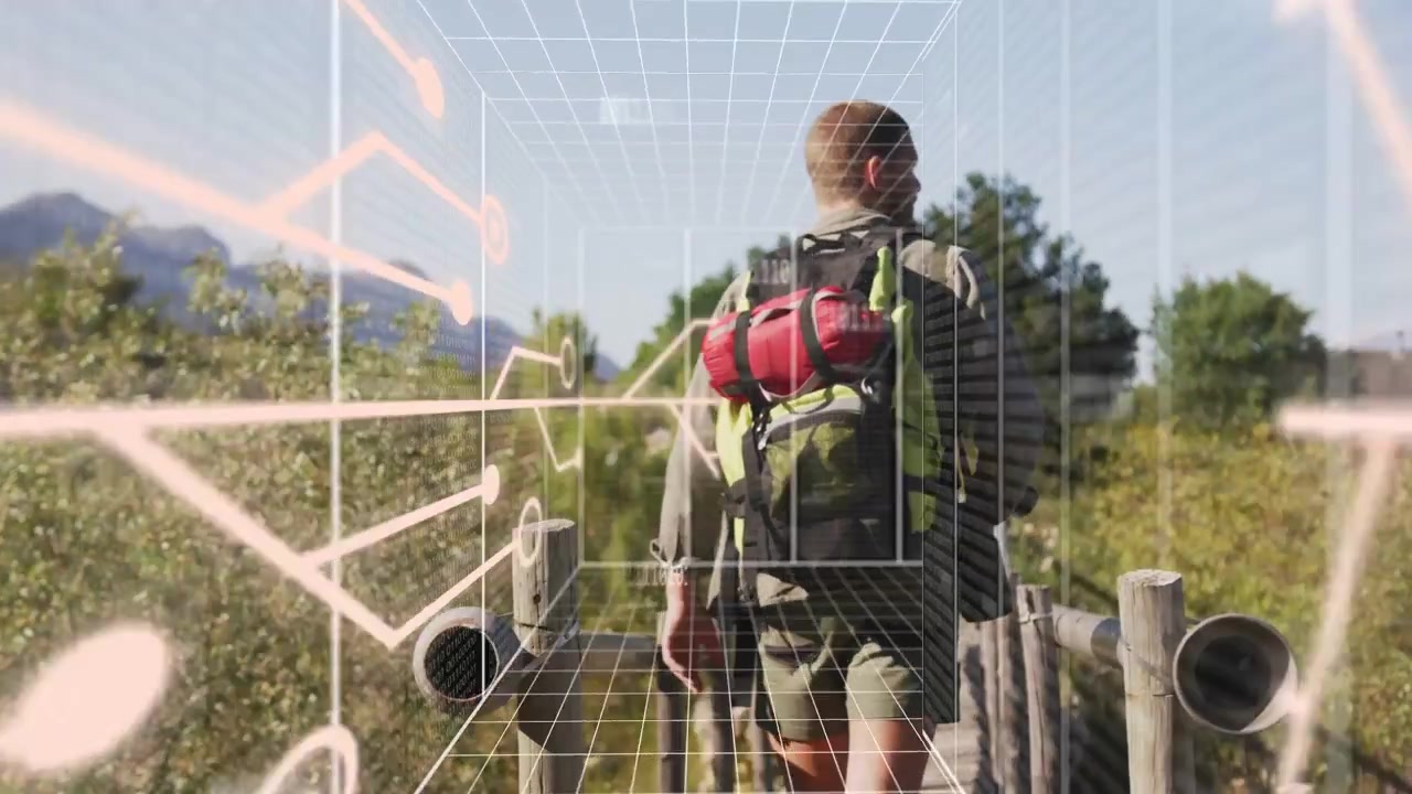 Male hiker with backpack walking boardwalk causing AR cube grid and traces overlaying path to peaks