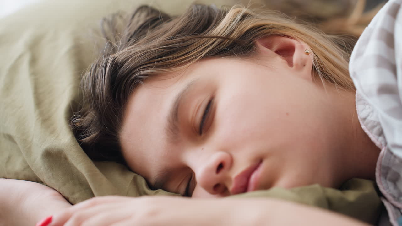 Sleeping Teen Portrait, Closeup Of Teen Peacefully Sleeping, Teenager Lying Calmly With Pillow In Tranquil Setting, Serene Closeup Image Of Young Person Dozing Peacefully With Soft Lighting