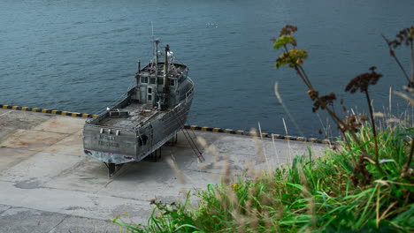 abandoned fishing boat on a dock