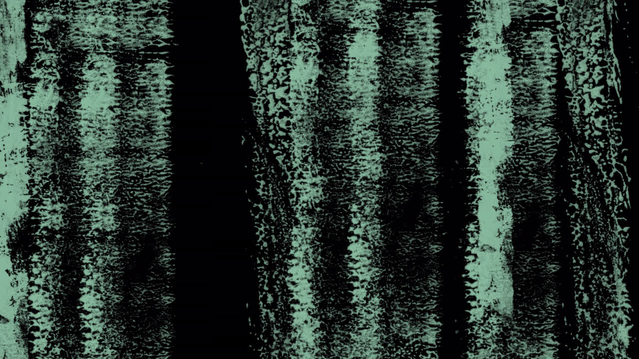Pohybující se abstraktní zelená tekutá textura na tmavém pozadí.