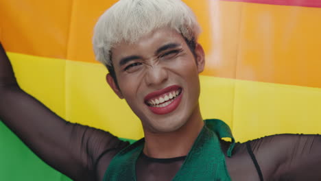 person celebrating pride with rainbow flag