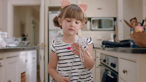 portrait-beautiful-little-girl-waving-magic-wand-having-fun-at-home-playing-pretend-enjoying-childhood-imagination