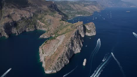 Panoramic aerial view of an amazing Salento gulf with the wake of speedboats.