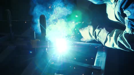 scorching welding tip during weld works in workshop metalworking plant