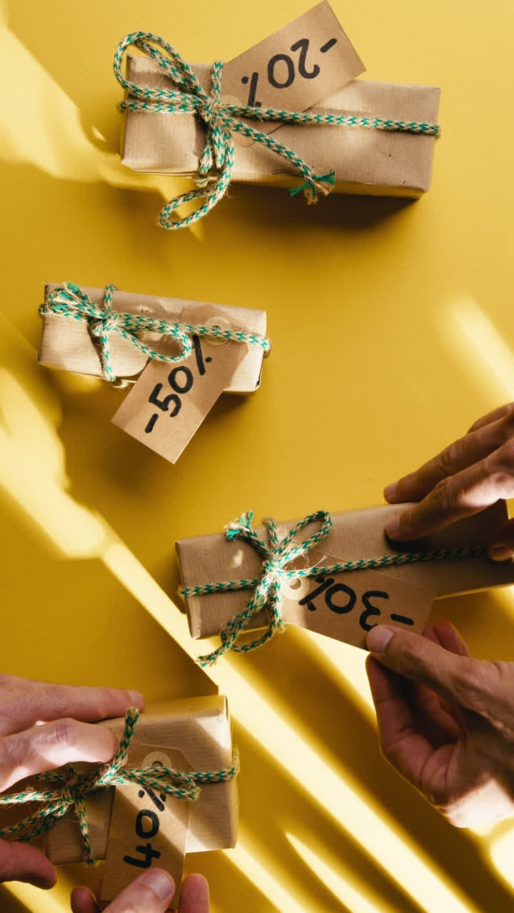 Yellow background with Black Friday Christmas gifts receiving discount tag