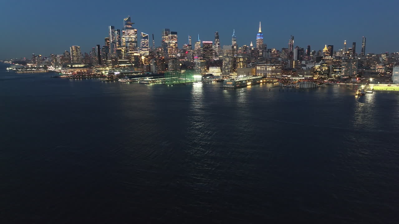 Aerial view of Midtown Manhattan and The Hudson River at night