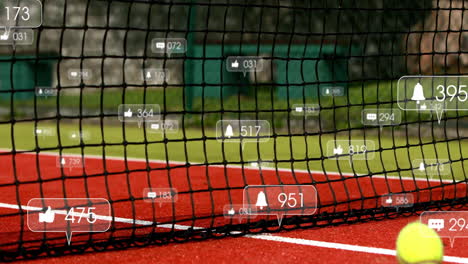 tennis net stretching across red court showing floating social media icons with counters