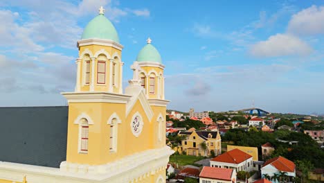 orbit frontal view of orange chapel towers of santa famia otrobanda curacao