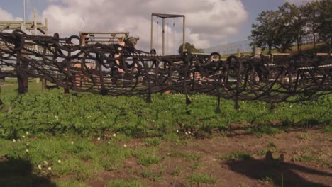 young adults training at an outdoor gym bootcamp