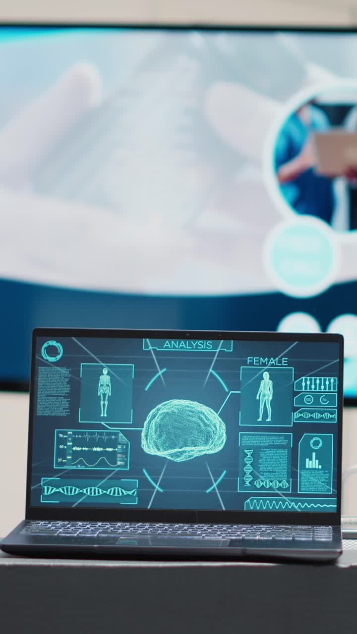 Vertical video: Registration desk with brain on laptop