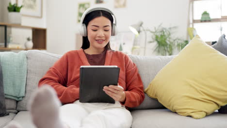 Happy-woman,-tablet-or-music-headphones-on-home