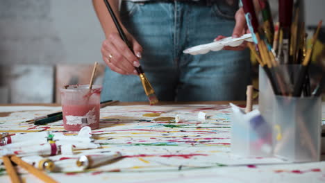 artist creating an abstract painting